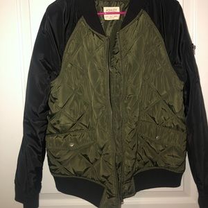 Green and black bomber jacket